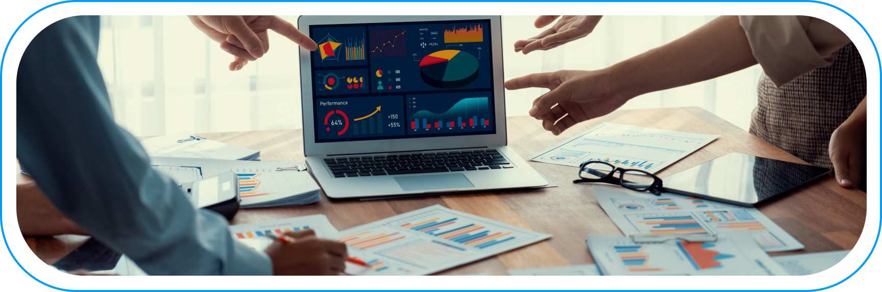 Analytics team reviewing marketing dashboards and ROI forecasts for mobile game campaigns