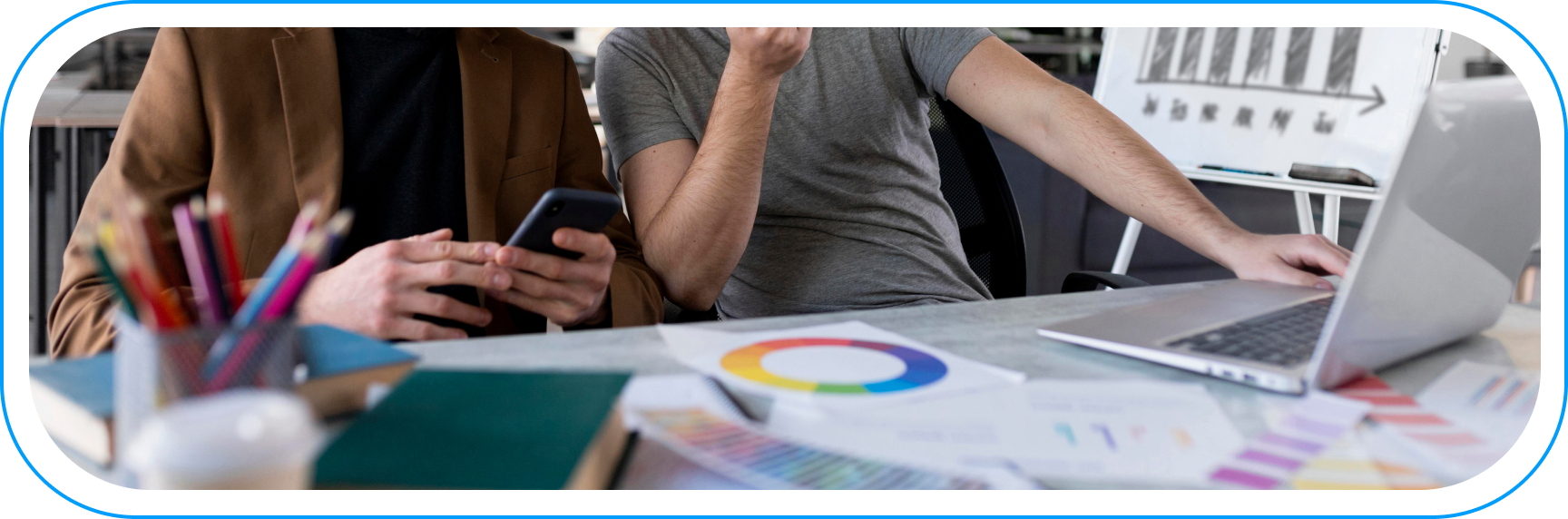 A startup team analyzing data and business reports while scaling the company and making analytics-based decisions